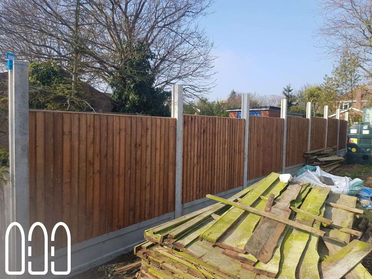 Close board fencing with concrete posts, gravel boards