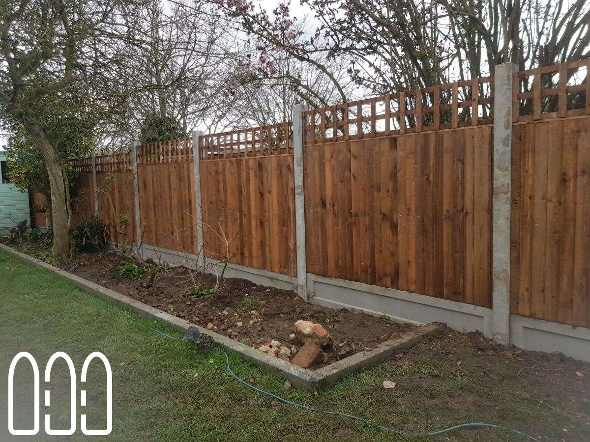 Close board fencing with concrete posts, gravel boards