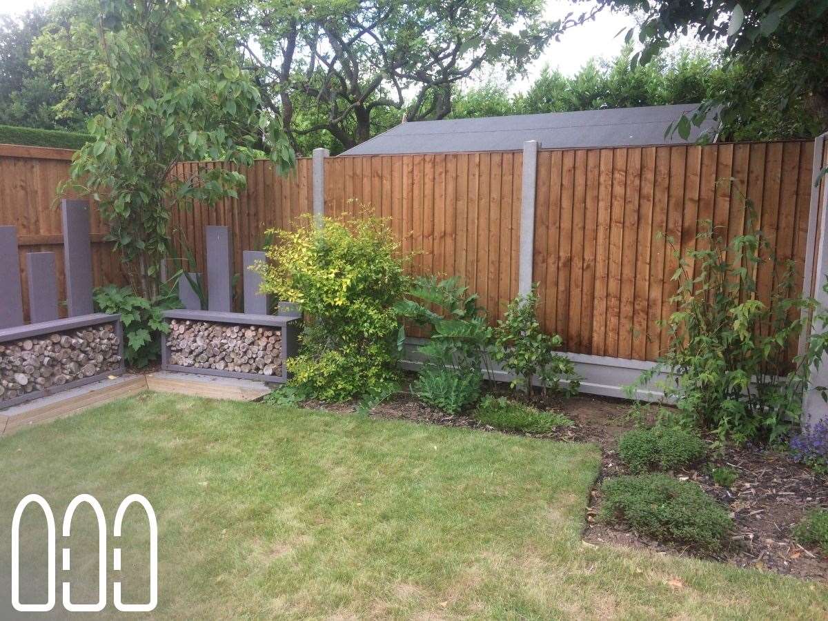 Close board fencing with concrete posts and gravel boards