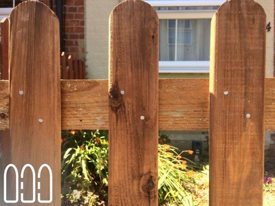 Picket Fence with Wooden Gate using round top palisades